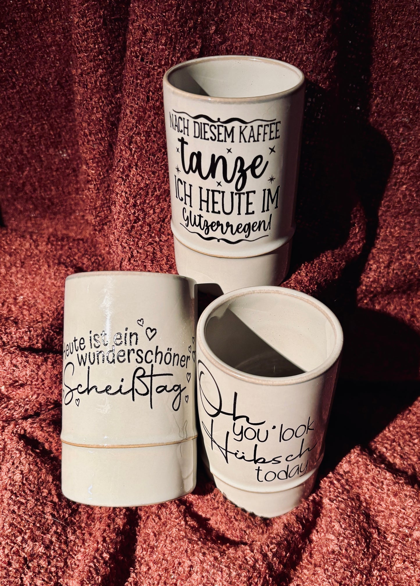 Keramiktasse mit Schriftzug